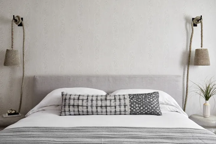 Queen bed with beach inspired decor