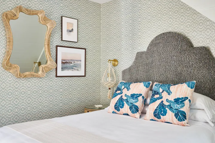 Queen guest room featuring coastal decor